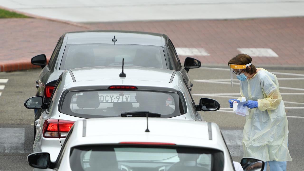 Cars queue at a pop-up COVID-19 testing site at the Australian National Maritime Museum in Sydney. Picture: NCA NewsWire/Joel Carrett