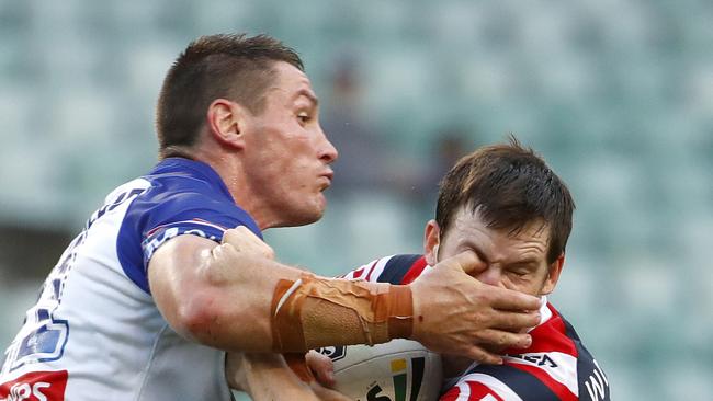 Josh Jackson giving Luke Keary some unintentional facial attention