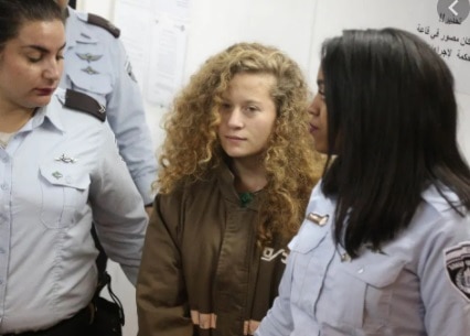 Ahmad Ahlam Tamimi in police custody.