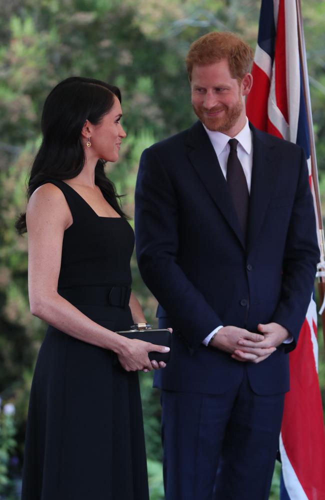 Her hair was down for a change, falling in soft shiny waves. Credit: AFP Photo/Pool/Brian Lawless