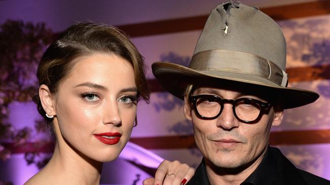 Johnny Depp with his former wife Amber Heard. Picture: Michael Kovac/Getty Images