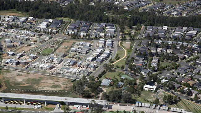 Aerial photos of Kellyville, which has expanded dramatically since the Metro was installed. Picture: Jonathan Ng