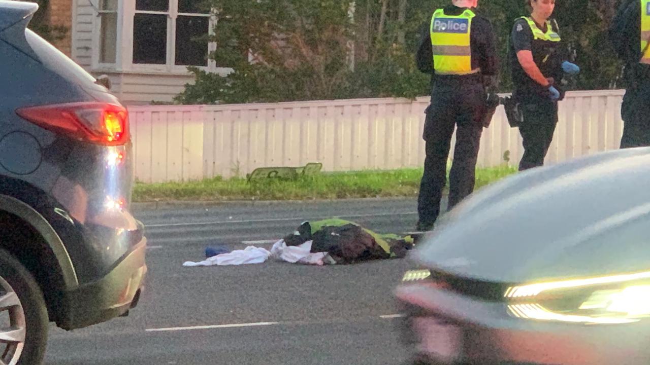 Police at the scene of a truck versus cyclist smash in Newcomb on Wednesday. Photo credit: Lincoln Holmes.