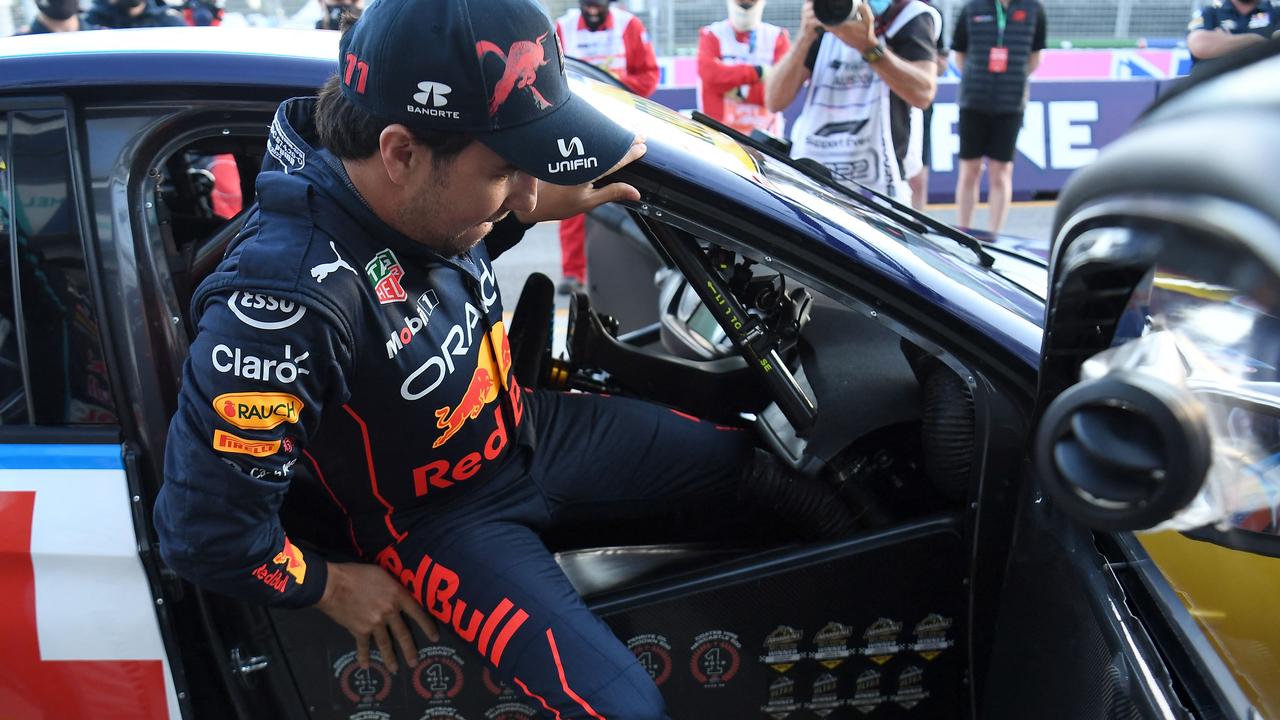 Red Bull's Mexican driver Sergio Perez gets ready to drive a Supercar at the Albert Park. Picture AFP