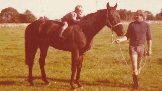 Trying the jockey crouch: young Chris Waller on galloper Totara Park with his dad John Waller in the late 1970s. Picture: Waller family