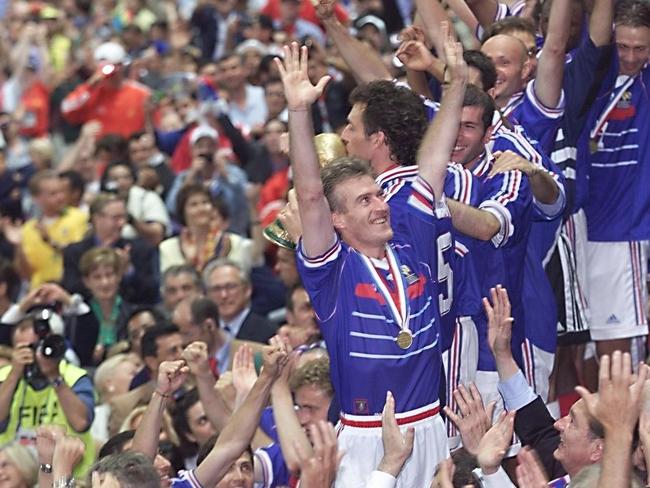 Didier Deschamps and his teammates celebrate their win in the 1998 World Cup final.