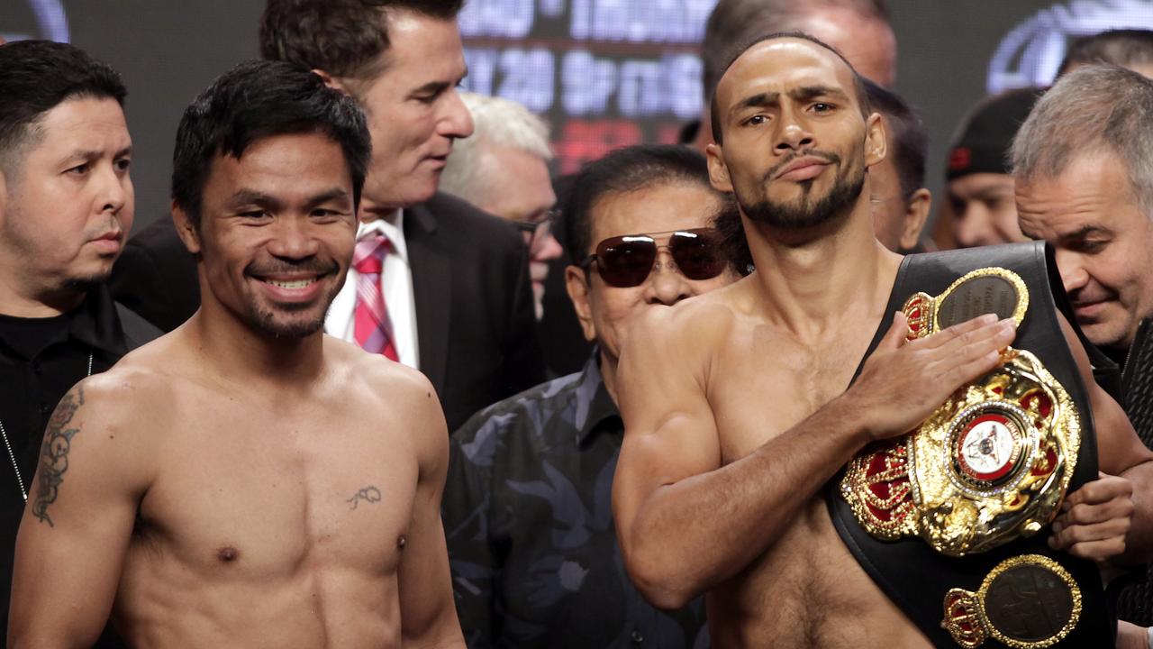 Keith Thurman (right) fought Manny Pacquiao in 2019. (Photo by John GURZINSKI / AFP)