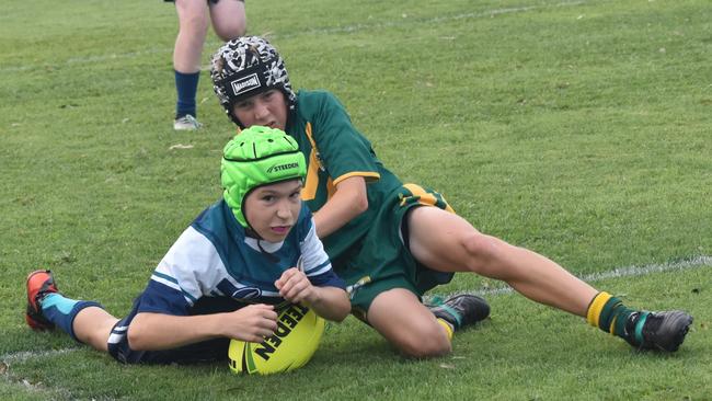 Lachlan Wedel goes over for Heights College in the Year 7C grand final against St Brendan’s. Photo: Pam McKay