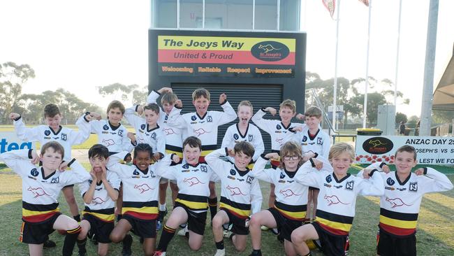 St Josephs Flying Joeys under-9 football team pull their funniest faces. Picture: Mark Wilson