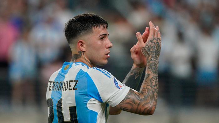 Argentina's midfielder #24 Enzo Fernandez celebrates his team's victory during the Conmebol 2024 Copa America tournament semi-final football match between Argentina and Canada at MetLife Stadium, in East Rutherford, New Jersey on July 9, 2024. (Photo by EDUARDO MUNOZ / AFP)