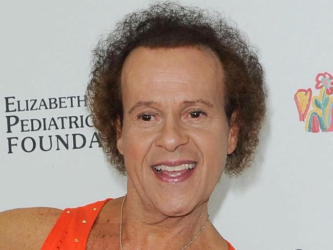 US fitness coach Richard Simmons attends the 2013 "A Time For Heroes" held at the century park in Los Angeles, June 2, 2013. Richard Simmons, Legendary Fitness Guru and TV Personality, Dies at 76. (Photo by Chris DELMAS / AFP)