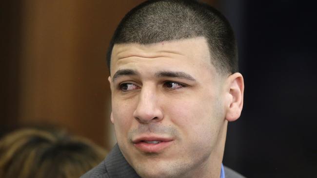 New England Patriots tight end Aaron Hernandez reacts to his double murder acquittal after the sixth day of jury deliberations at Suffolk Superior Court in Boston. Hernandez's lawyer said Thursday, Sept. 21, 2017, the former tight end's brain showed severe signs of the degenerative brain disease chronic traumatic encephalopathy.
