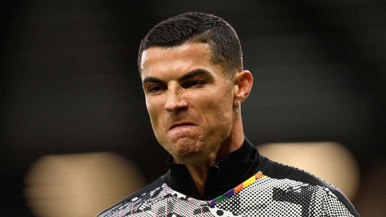 (FILES) In this file photo taken on October 30, 2022 Manchester United's Portuguese striker Cristiano Ronaldo gestures as he warm up ahead of the English Premier League football match between Manchester United and West Ham United at Old Trafford in Manchester, north-west England, on October 30, 2022.