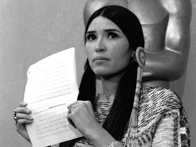 Sasheen Littlefeather holds up a statement that she read 23/3/1973, at the Academy Awards in LA on behalf of Marlon Brando who declined to accept his best actor Oscar to protest the treatment of Native Americans in tv and movies. (AP Photo,FILE) headshot red indian oscars