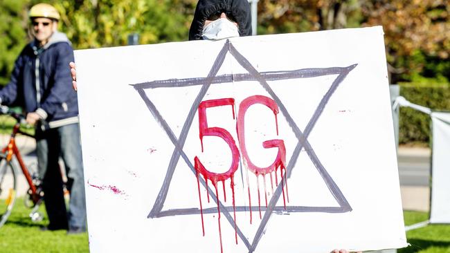 A 5G conspiracy theorist at an anti-vaccination rally in Melbourne. Picture: Tim Carrafa