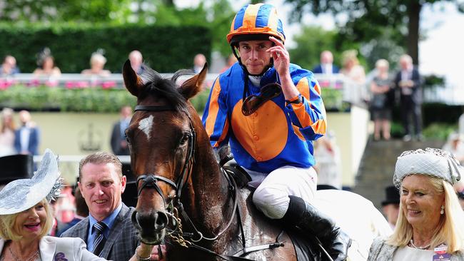 Jockey Ryan Moore celebrates after guiding Order of St George to victory in the Gold Cup at Ascot Racecourse on June 16. Picture: Getty Images