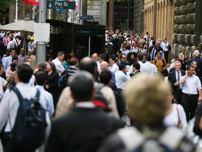 A mass exodus of office workers at Martin Place in Sydney, during a power outage that caused traffic chaos and panic among office workers and residents trapped in high-rise buildings in CBD and suppounding areas.