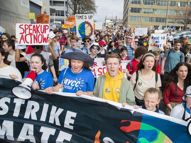 Bryher Mckewin (with mic) , Amelie Hudspeth and Toby Thorpe. Climate strike rally in Hobart. Picture: RICHARD JUPE