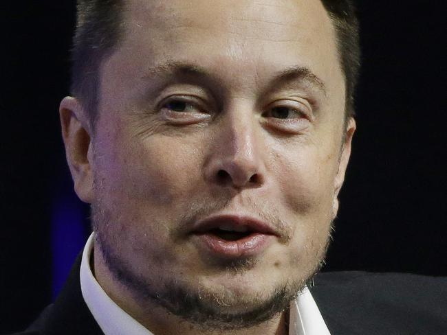 FILE - In this July 15, 2017, file photo, Tesla and SpaceX CEO Elon Musk responds to a question by Nevada Republican Gov. Brian Sandoval during the closing plenary session entitled 
