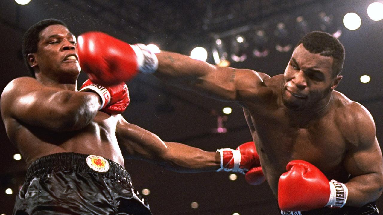 Mike Tyson v Roy Jones Jnr: Mike Tyson's greatest knockouts; Larry Holmes