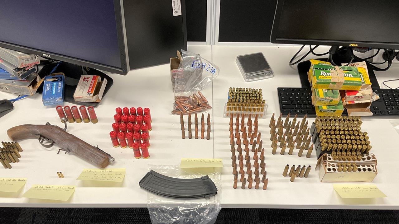 Police allegedly seized an arsenal of weapons and ammunition following a raid on a Highfields property on January 19, 2023.