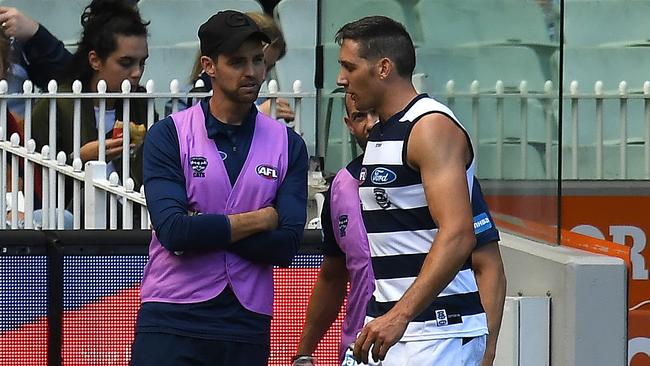 Harry Taylor off the ground after hurting his foot. Picture: AAP