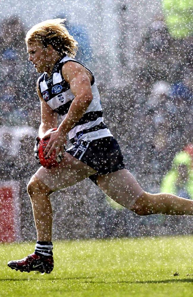 2004: It was raining Cats and Crows as a young Gary Ablett Jr gave Geelong fans a portent of things to come against Adelaide. Ablett retires a great, just like his father, after yesterday’s Grand Final. Picture: Colleen Petch