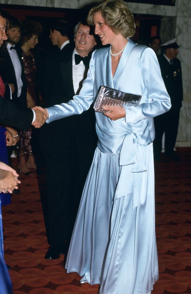 Diana’s Style: 1984 -: Diana, pregnant with her second son, attending a film premiere in Leicester Square just weeks before his birth. She is wearing a pale blue Catherine Walker gown. Picture: Getty