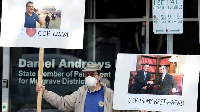 Protestors outside Daniel Andrews' electoral office voice their concerns about Victoria's financial links with China and its communist regime. Picture: Andrew Henshaw