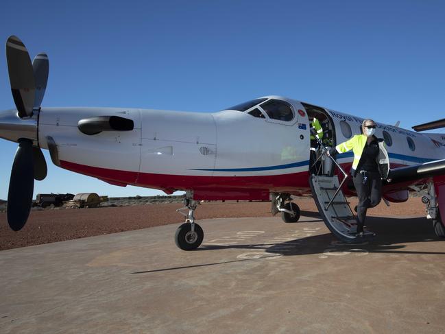 ADELAIDE, AUSTRALIA - Advertiser Photos JUNE 29, 2021: The Royal Flying Doctor Service vaccination team, members of the Primary Health Care Service located at RFDS Port Augusta Base landing in Glendambo SA (situated on Stuart Highway) Airstrip. As RFDS starts rolling out COVID-19 vaccinations in outback South Australia. Picture: Emma Brasier