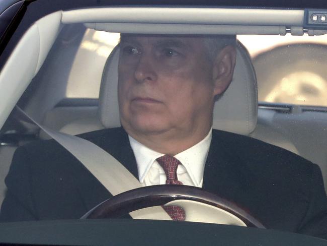 Britain's Prince Andrew drives into Buckingham Palace, as he arrives for the traditional Queen's Christmas lunch, in London, Wednesday Dec. 18, 2019.  Members of the royal family attend the family event celebrating Christmas. (Aaron Chown/PA via AP)