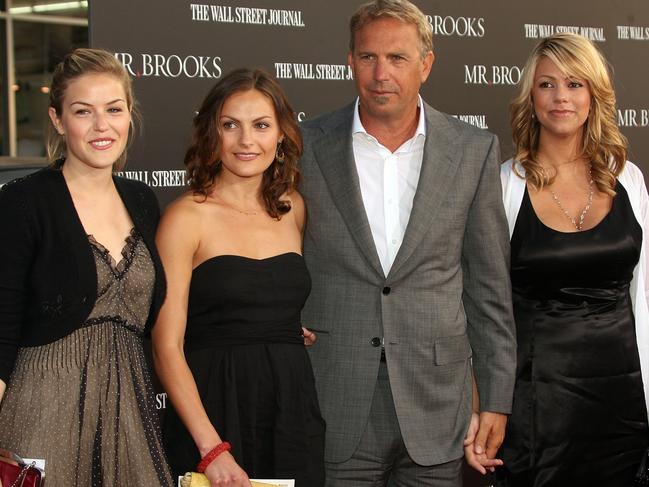 Kevin Costner – with wife Christine (far right) – has two adult children from his first marriage, Lily (left) and Annie. Picture: Frederick M. Brown/Getty Images