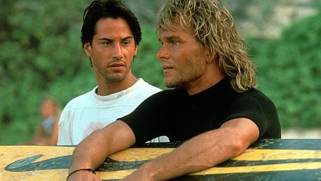 Keanu Reeves with Patrick Swayze in scene from film "Point Break".