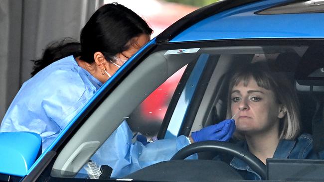 A women has COVID-19 test at the Murarrie clinic in Brisbane on Tuesday. Picture: Getty Images