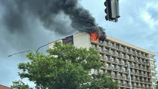 Flames billow from the Pacific Hotel. PHOTO: Jess Kelly