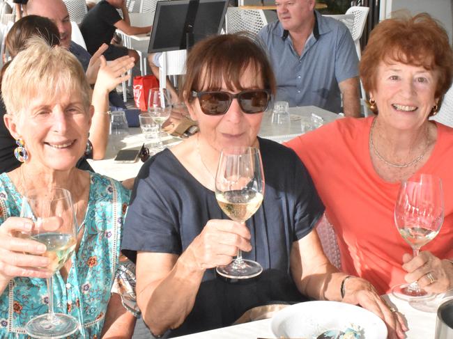 Whitsundays Tourism Ambassadors Wendy Downes of Cannonvale, Ingrid Maring of Cannonvale, and Carolyn Williams of Cannon Valley celebrating National Volunteer Week at the Whitsundays Sailing Club. Picture: Kirra Grimes.