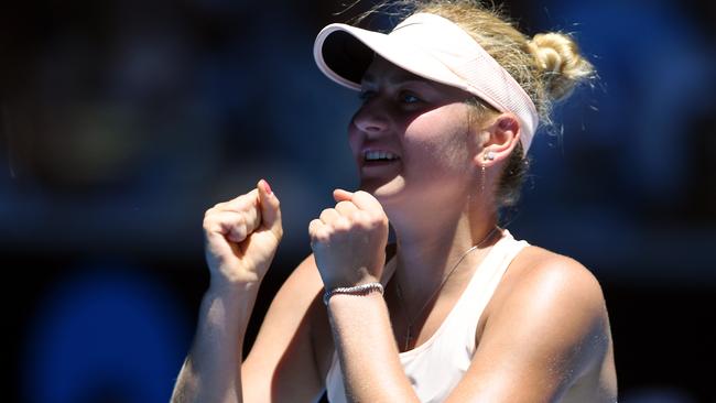 Marta Kostyuk of Ukraine celebrates her win against Olivia Rogowska.