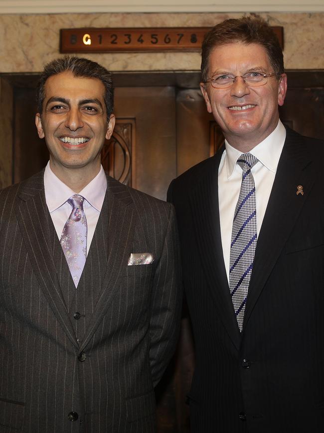 Dr Kia Pajouhesh with former Victorian premier Ted Baillieu marking the Manchester Unity building’s 80th birthday.