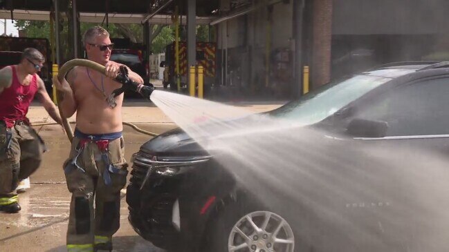 Heroes make a splash: Dearborn Heights firefighters go shirtless for charity car wash