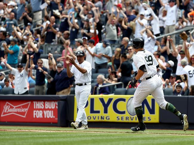 Judge's 1st slam helps Yankees beat A's, 9-5