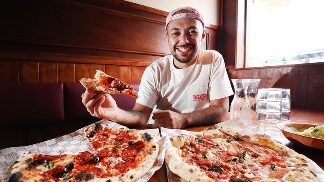 Franc Jrs have opened their second Gold Coast venue at Nobby's Beach .Co owner and chef Carlos Lara with some of their delicious Pizza. Picture Glenn Hampson