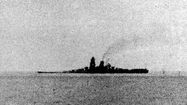 Final moments ... This grainy photo shows the battleship Musashi down by the bows as she takes on water from multiple torpedo hits. Source: Supplied