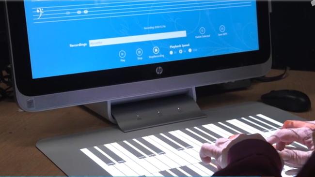 Tickling the ivories using the Sprout’s piano app