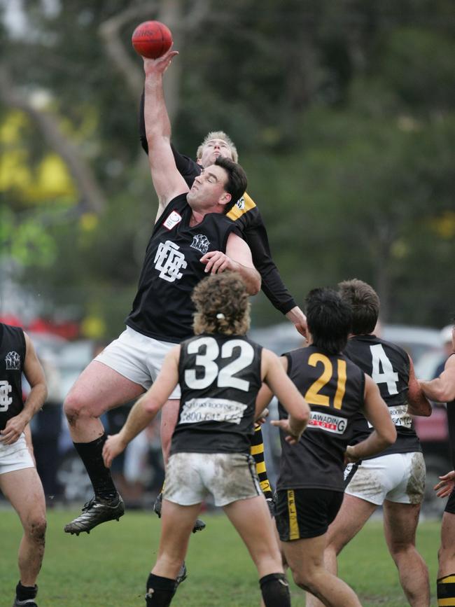 The indomitable Adam Slater wins another ruck contest. Adam Picture: Garry Sparke