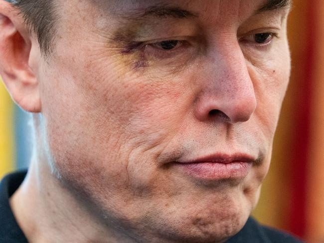 TOPSHOT - Elon Musk looks on during a news conference with US President Donald Trump in the Oval Office of the White House in Washington, DC, on May 30, 2025. Musk, who stormed into US politics as President Trump's chainsaw-brandishing sidekick, announced on May 28 that he is leaving his role in US government, intended to reduce federal spending, shortly after his first major break with the President over Trump's signature spending bill. (Photo by Allison ROBBERT / AFP)