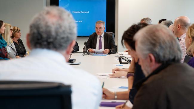 Minister for Health and Wellbeing Stephen Wade in discussions with unions on Friday. Picture: MATT TURNER.