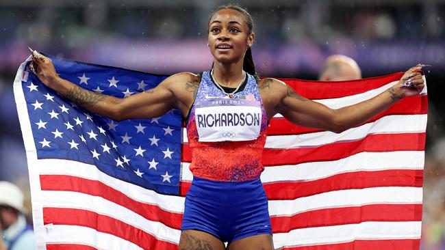 PARIS, FRANCE - AUGUST 03: Sha'Carri Richardson of Team United States celebrates winning the silver medal after competing the Women's 100m Final on day eight of the Olympic Games Paris 2024 at Stade de France on August 03, 2024 in Paris, France. (Photo by Hannah Peters/Getty Images)