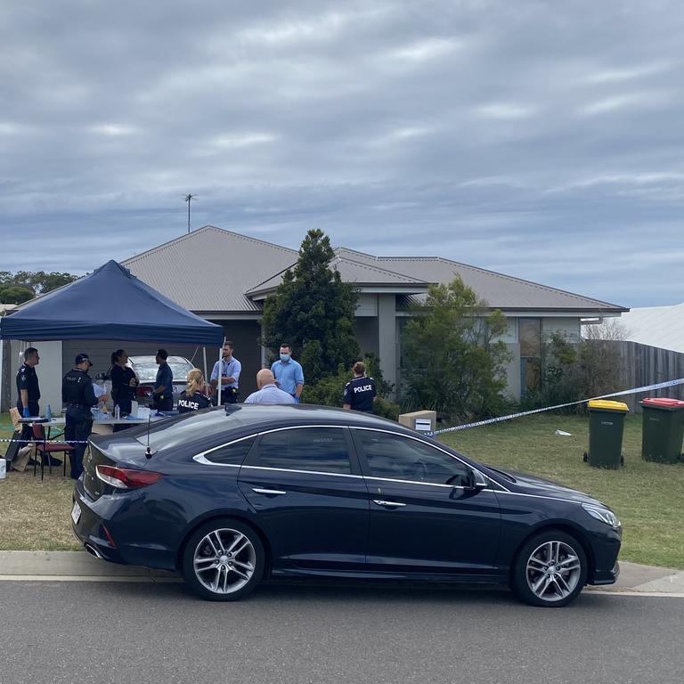 Police remained stationed at 18 Blaxland Court, Glen Eden, Gladstone on Thursday, April 21, 2022.