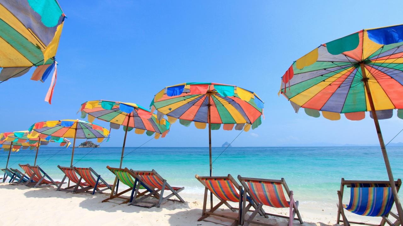 Phuket Beach in Thailand where you can rent a sunbed, chair and umbrella.