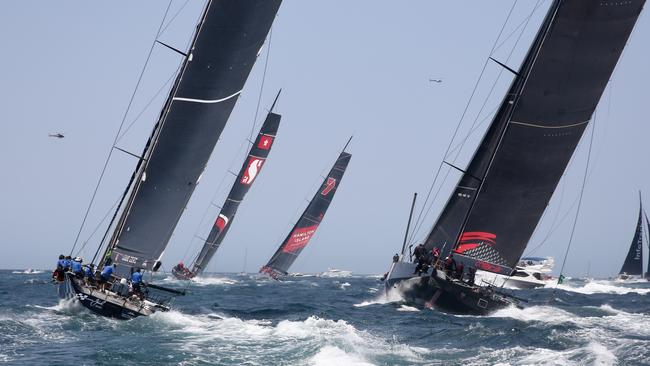 Supermaxis stream out of Sydney Heads at the start of last year’s Sydney-Hobart. Picture: Ryan Osland